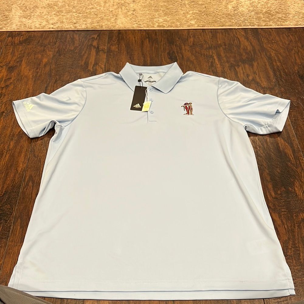 Adidas Perf Polo light blue color size XL with Merlin Embroidered on chest NWT